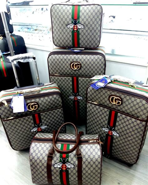 gucci suitcase set.